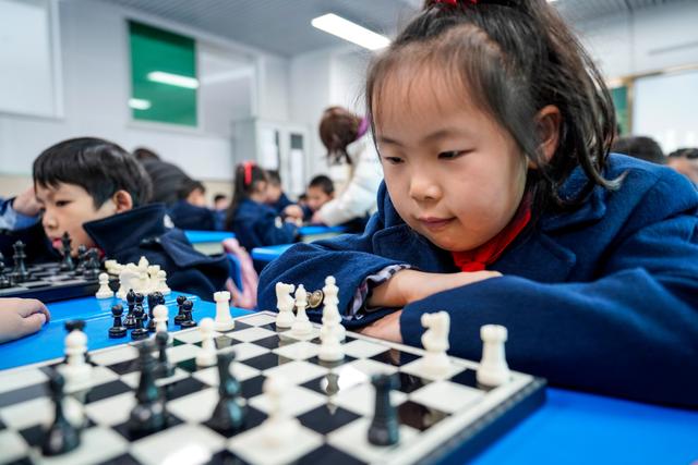 上课玩国际象棋英语怎么说 上课玩国际象棋英语怎么说写